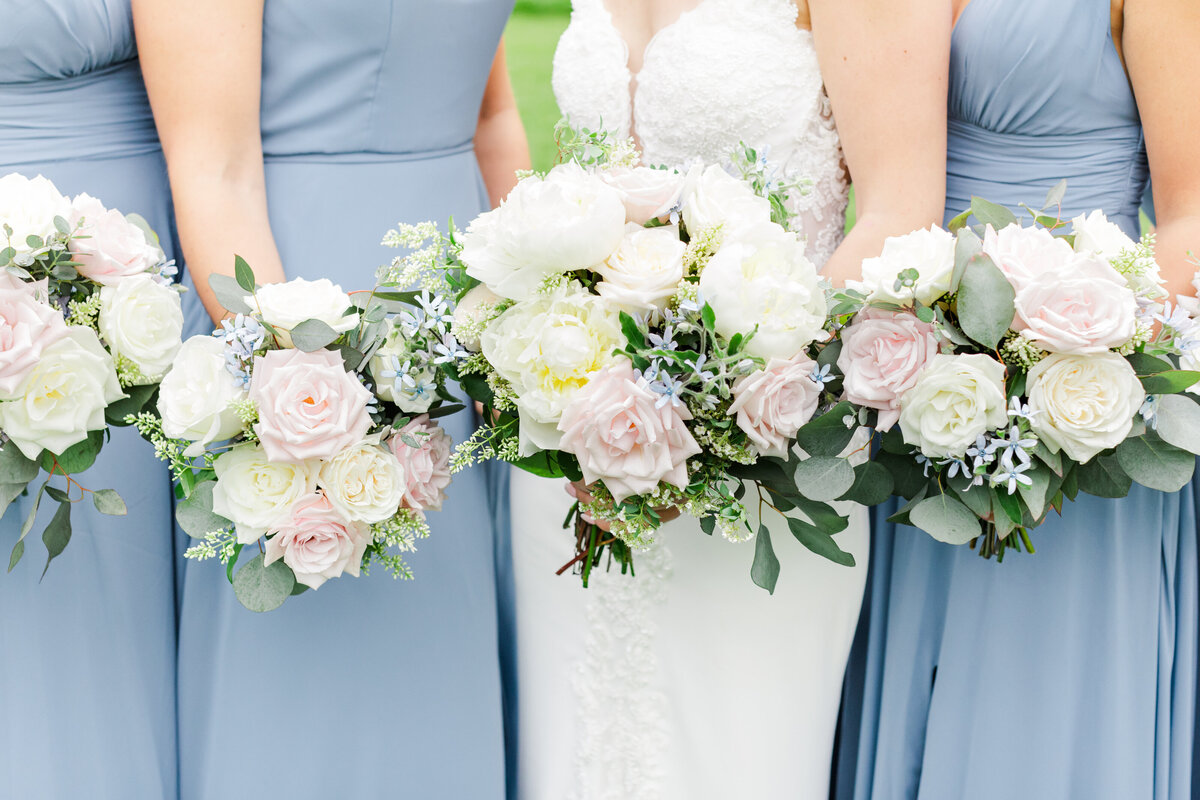 24_daffodil_parker_wedding_bouquet_blue_bridesmaid_dresses