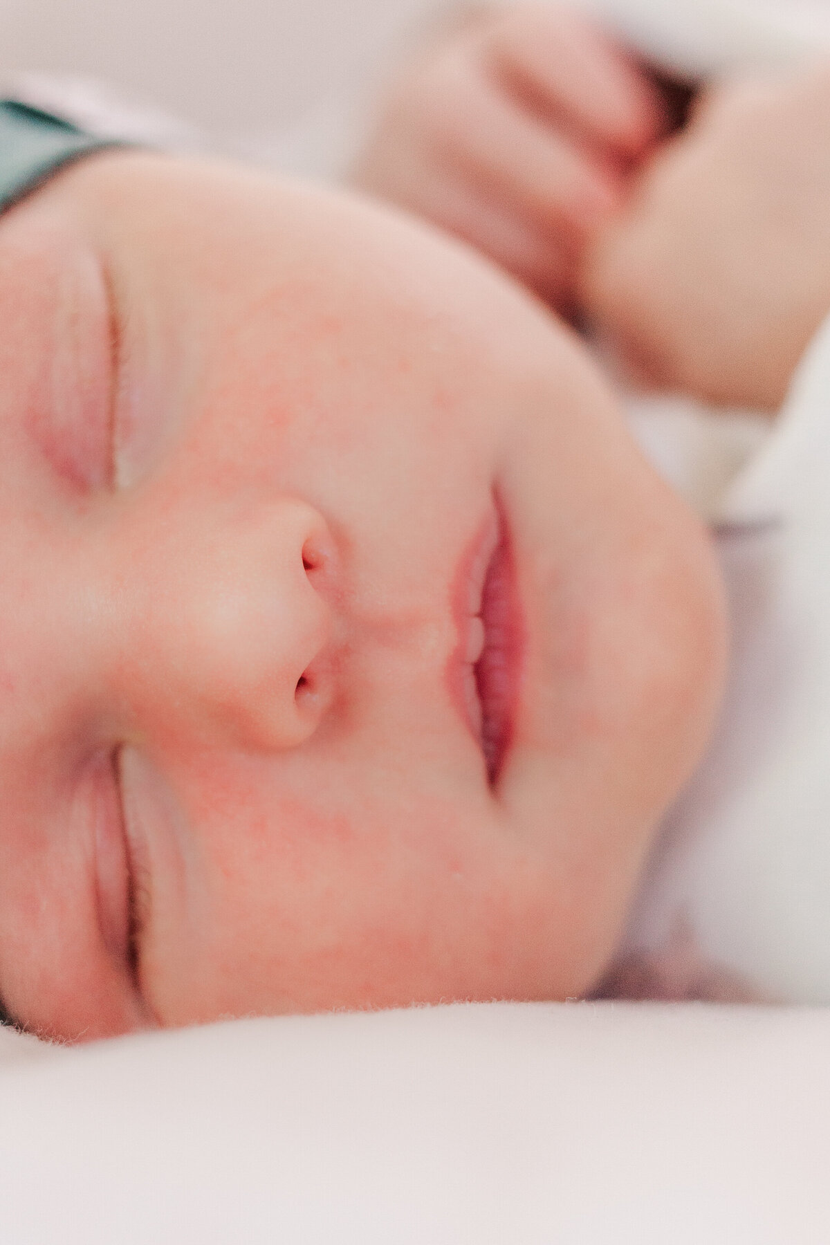 close up of face of sleeping newborn baby