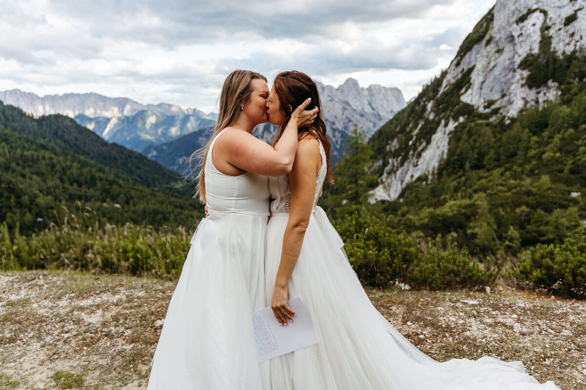 Romantic wedding kiss mountain elopement Slovenia