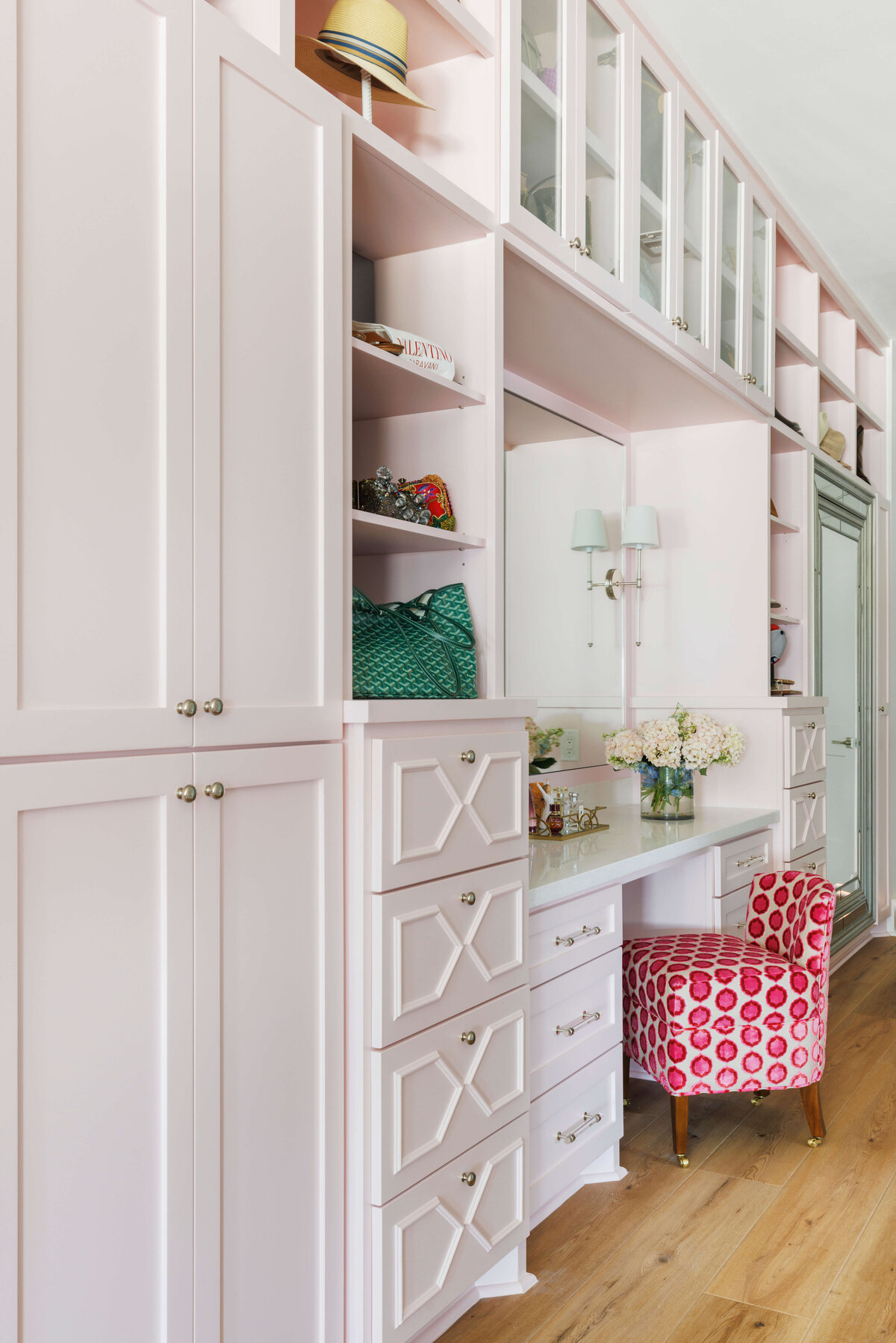 oyster creek studios lighthouse on the lake white cabinets and shelving with hot pink stool and desk