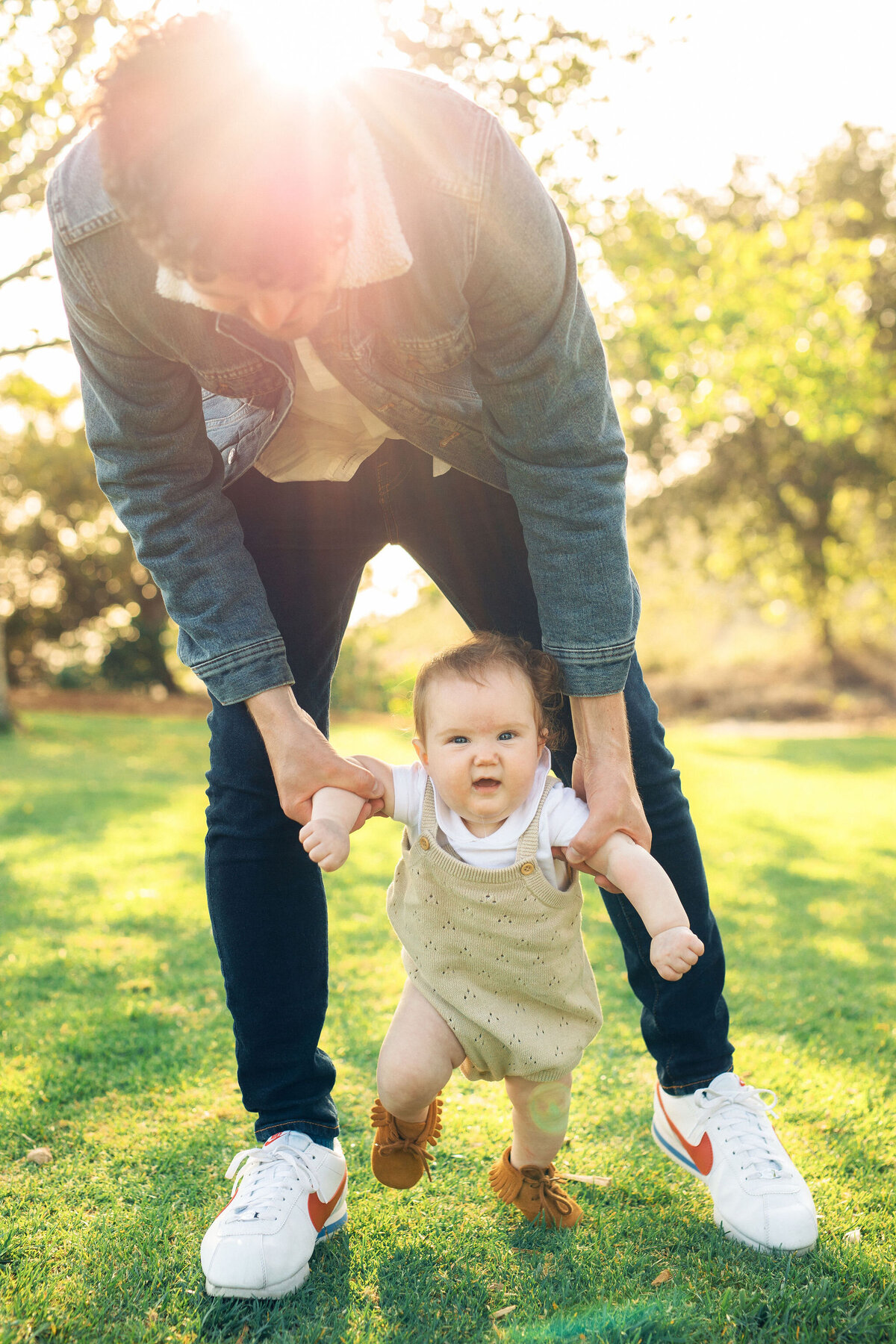 Family Portrait Photo Of Father Holding His Baby While Walking Los Angeles