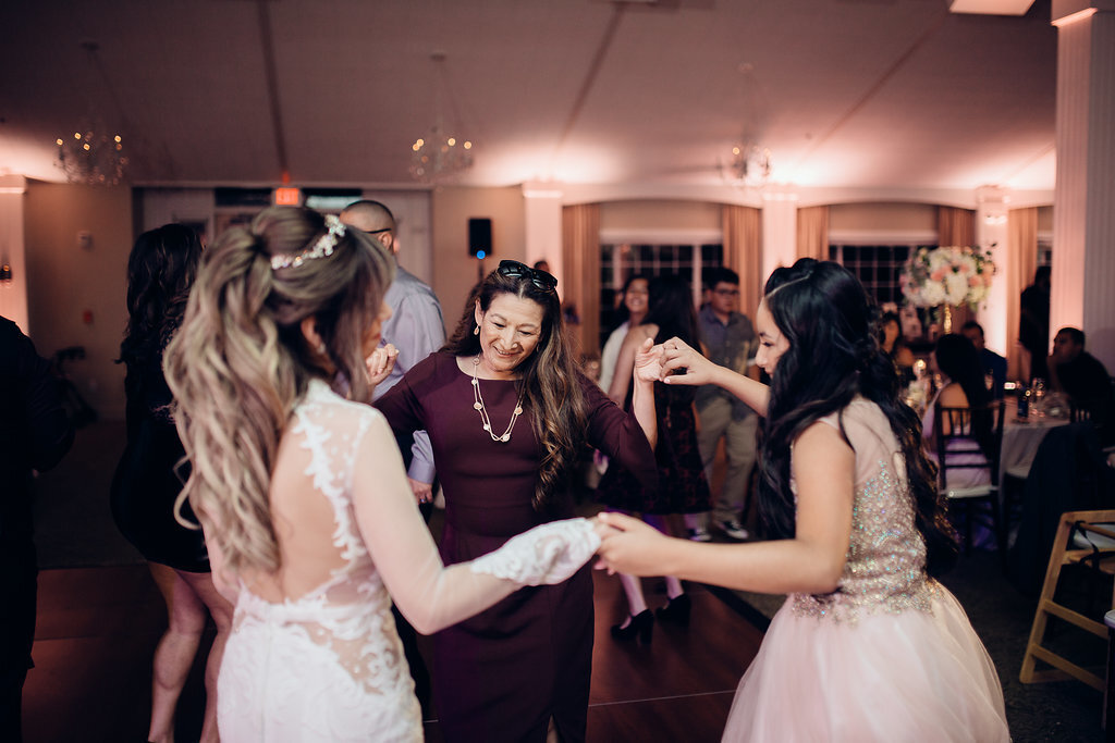 Wedding Photograph Of Bride And Women Forming a Circle Los Angeles