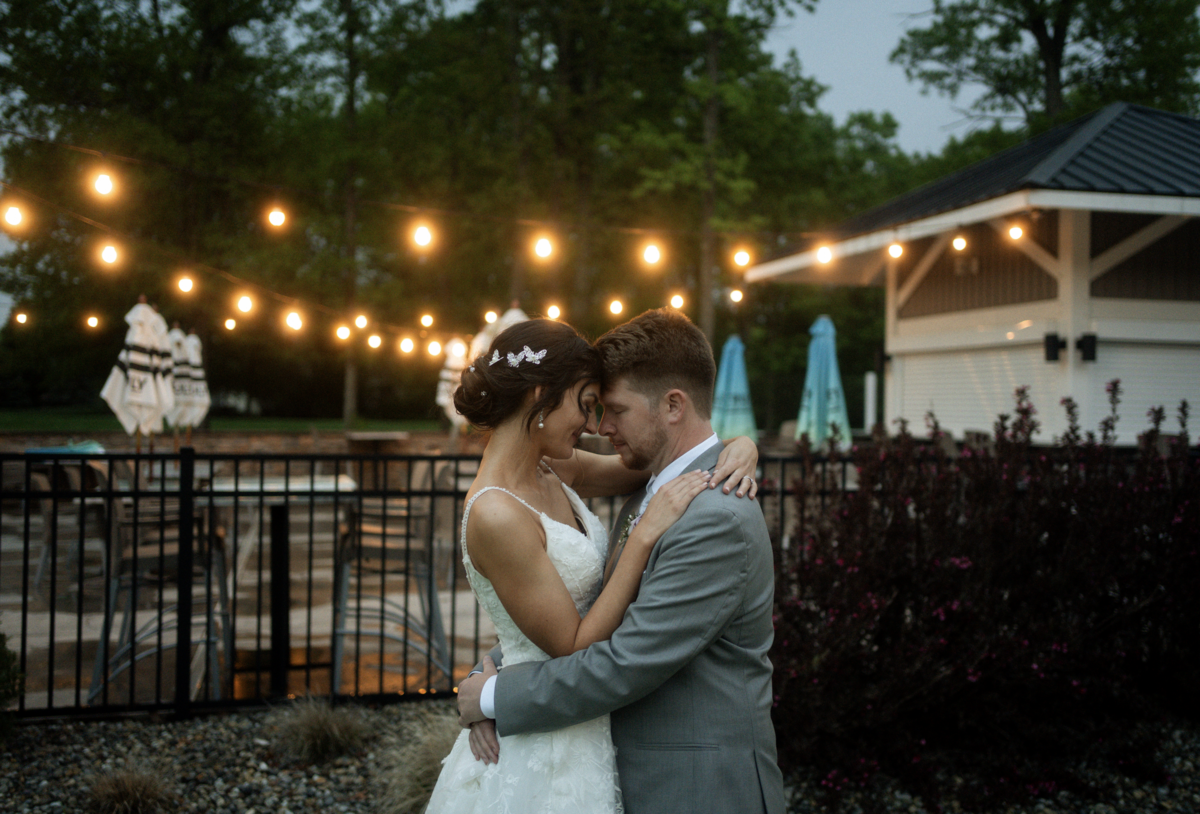 bride & groom smiling