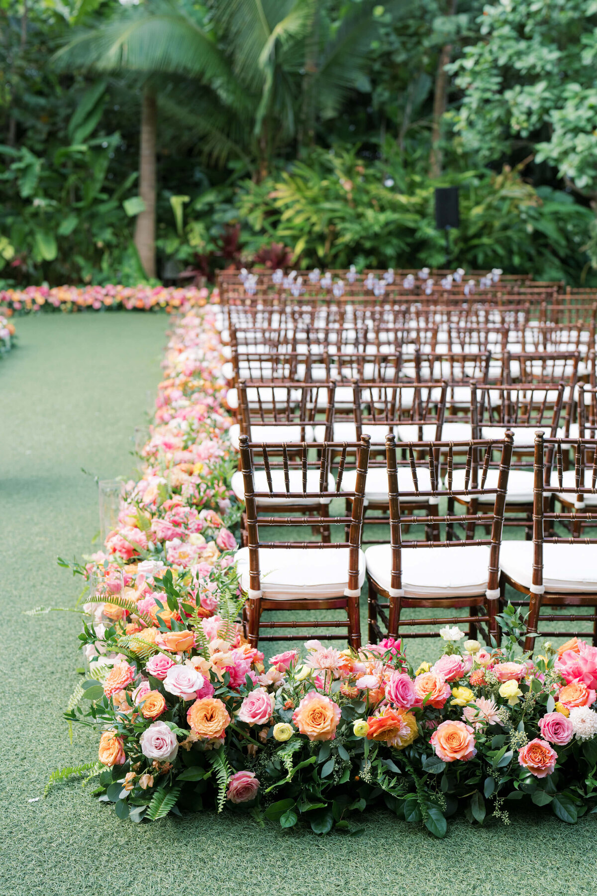 Flowers lining the aisle at Rosewood Baha Mar