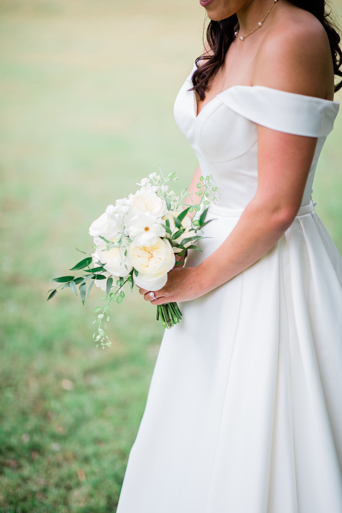 graceful bride with magnificent wedding bouquet The Georges