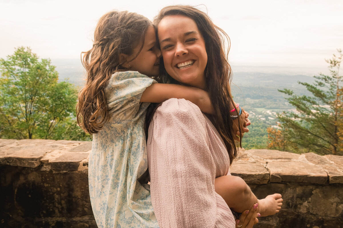 a family poses during a photo shoot in signal mountain