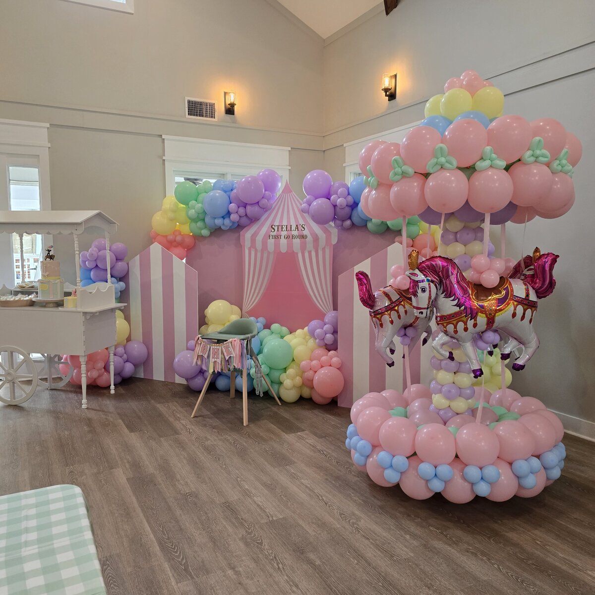 Air with Flair Decor popular balloon backdrops featuring a full carousel theme for a girl’s event party in Raleigh, perfect for elegant and playful celebrations.