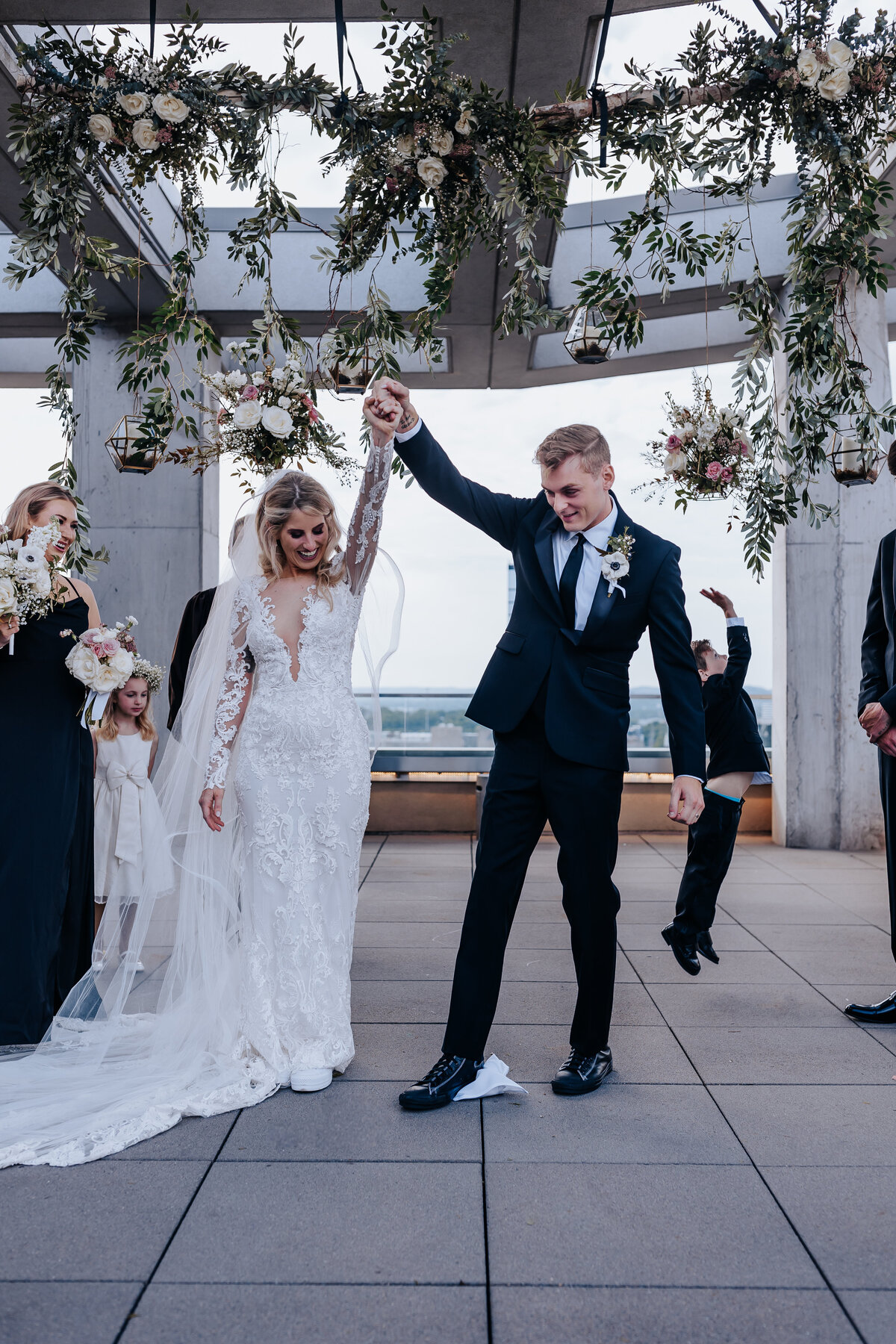 Nashville wedding photographer captures bride and groom celebrating after recent marriage