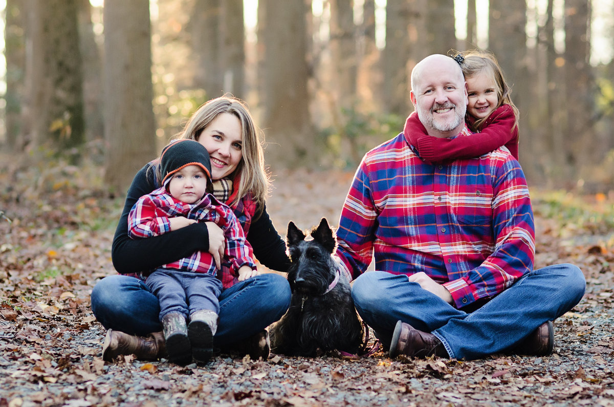 Portrait of a family of four with a dog taken at Nottoway Park in Northern Virginia by Sarah Alice Photography