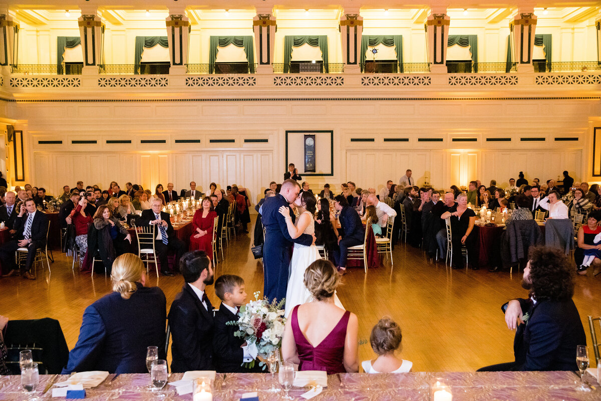 couple doing first dance at wedding reception in soldiers and sailors memorial hall