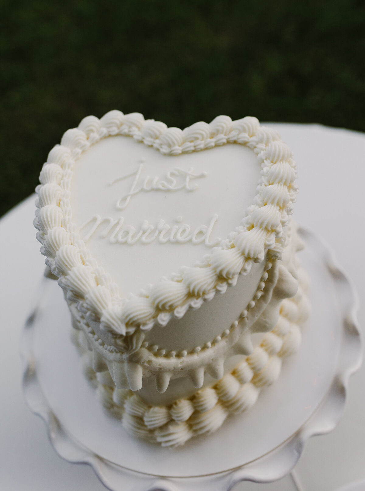 Heart shape cake saying just married