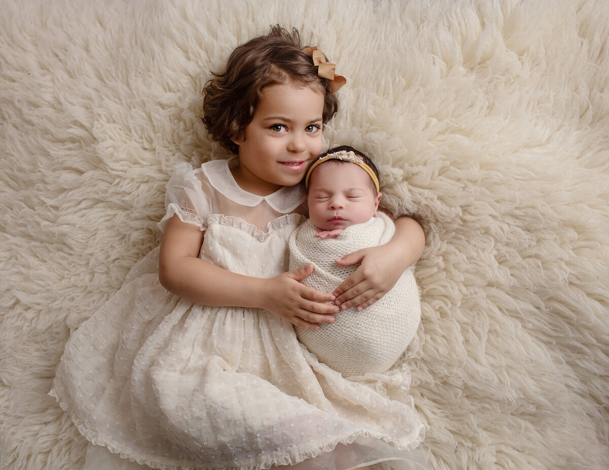 sibling photo for newborn session in boulder studio