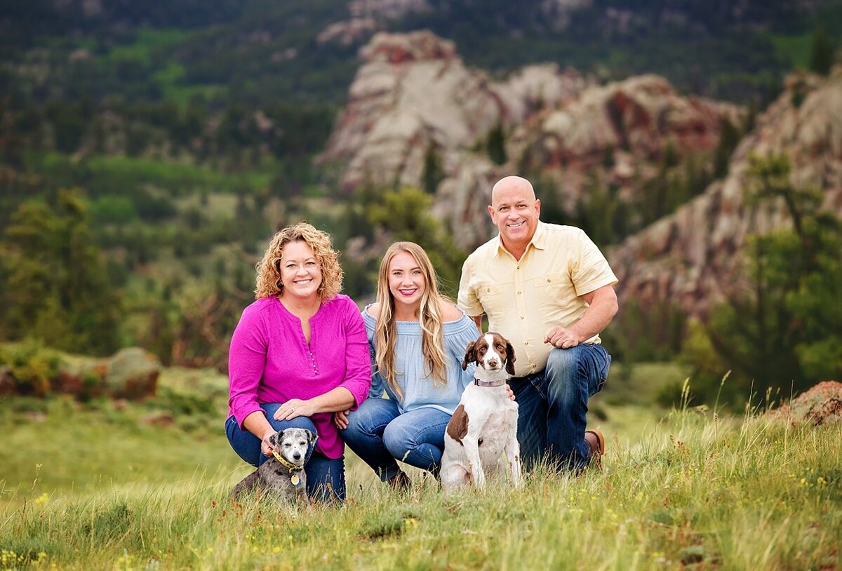 Family picture taken in the spring in the Vedauwoo mountains with their sweet dogs.