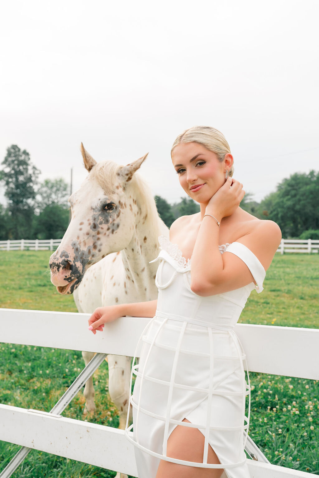 Modern bridal dress with detachable elements and lace-detailed blusher veil