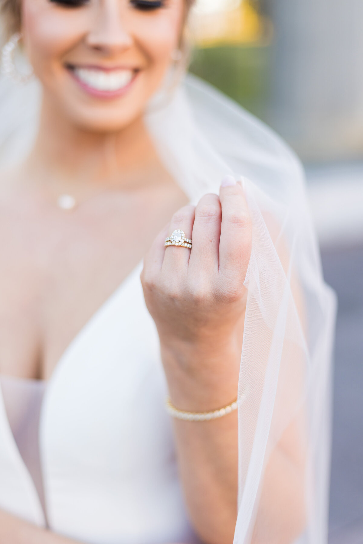 Bride holding up veil at Tennessee State Museum, Nashville