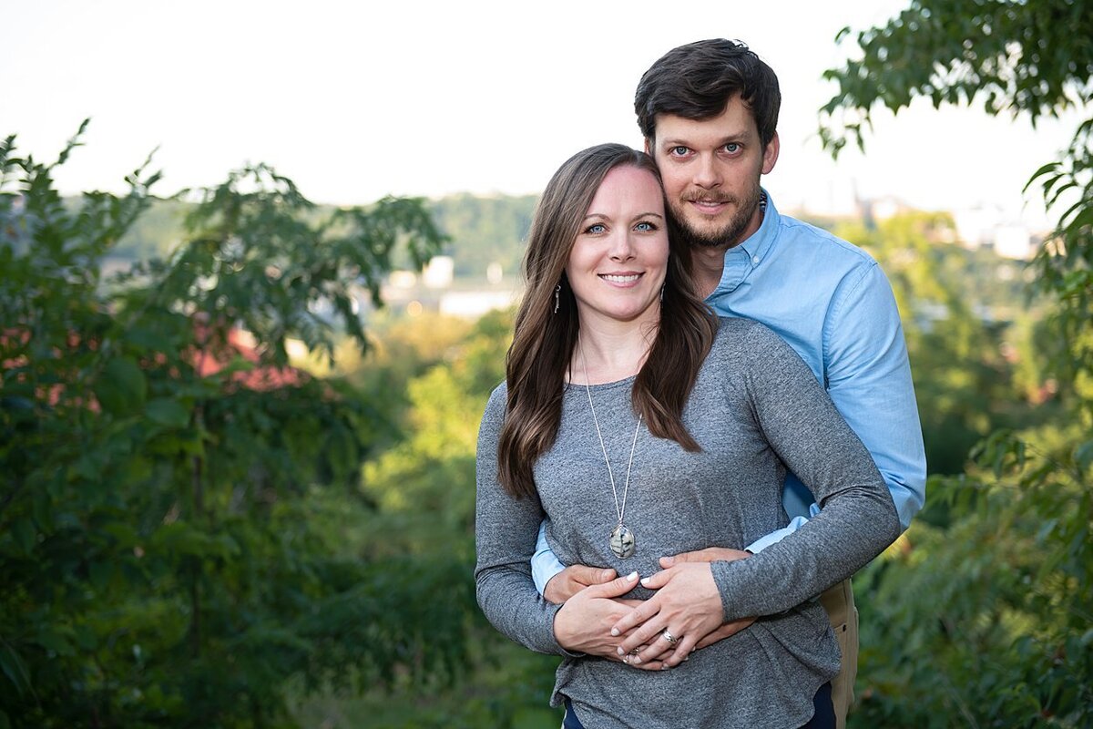 Image of engaged couple from their engagement session overlooking the city of Pittsburgh, PA