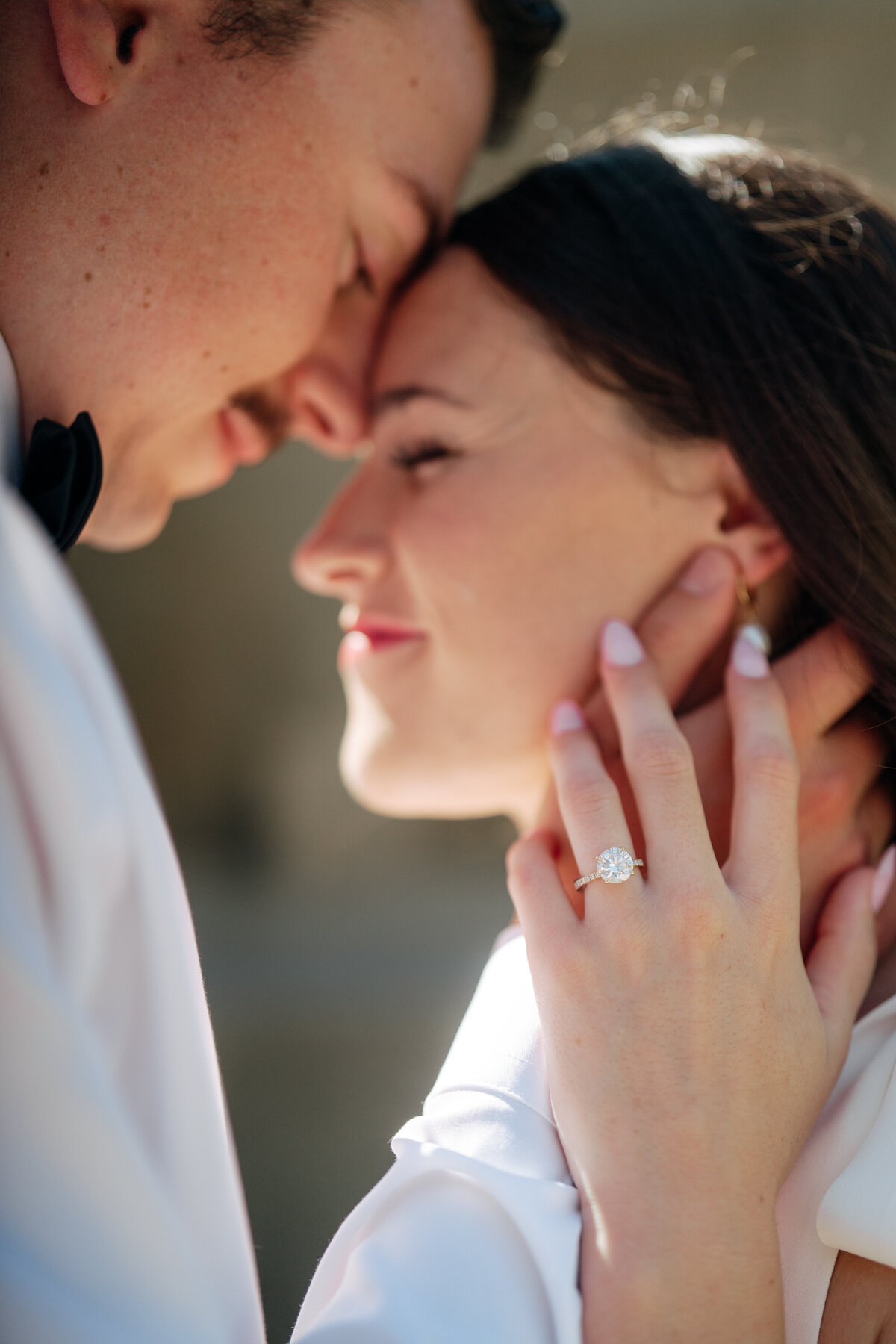 Couple during golden hour engagement shoot in Boise, Idaho wedding/elopement - photographed by The Storytellers