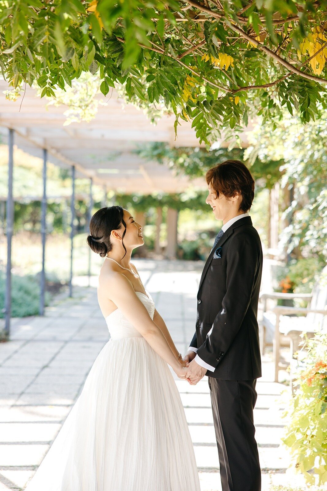 Bride and groom starring at each other