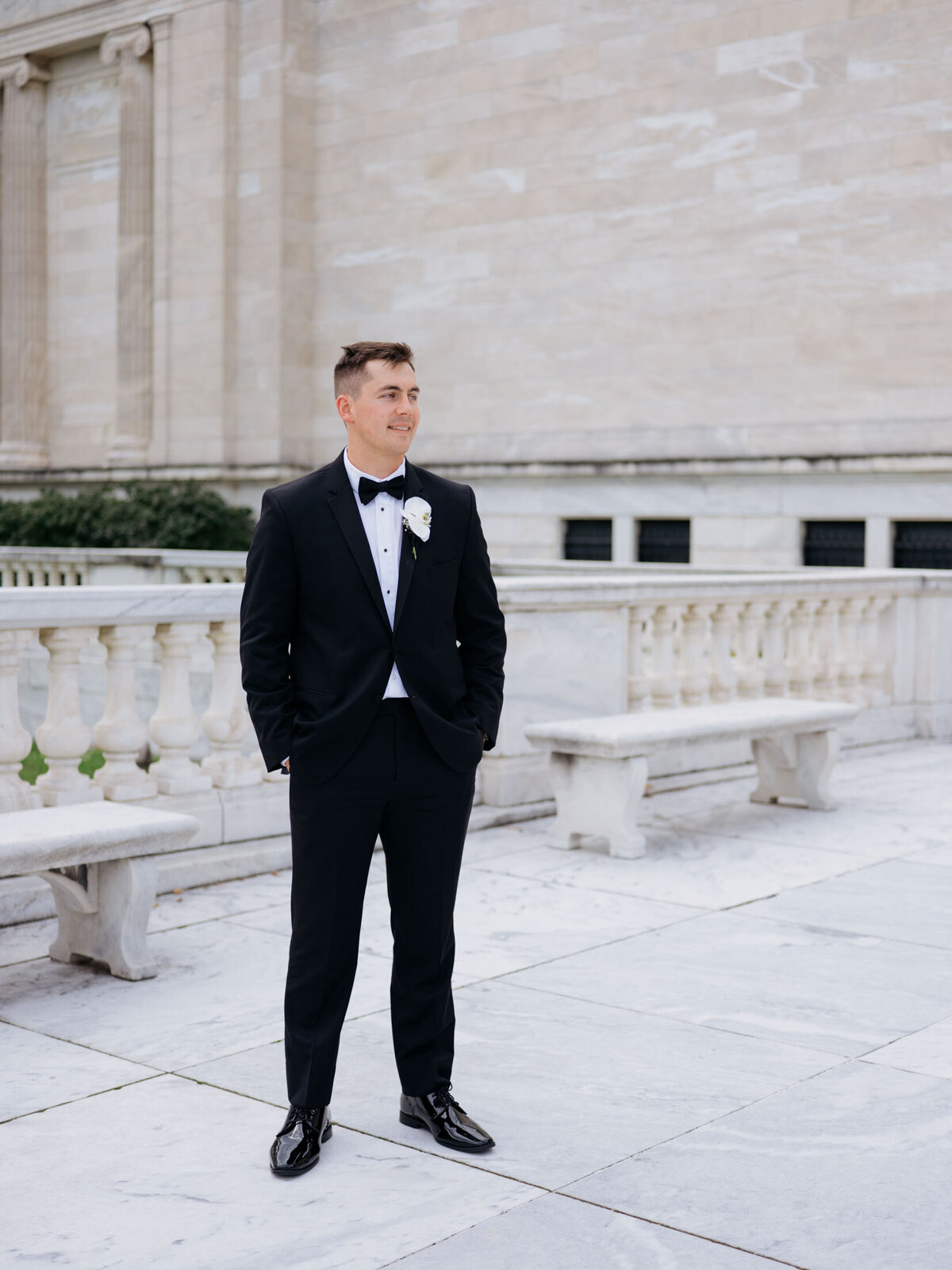 Groom in black suit at Cleveland Art Museum