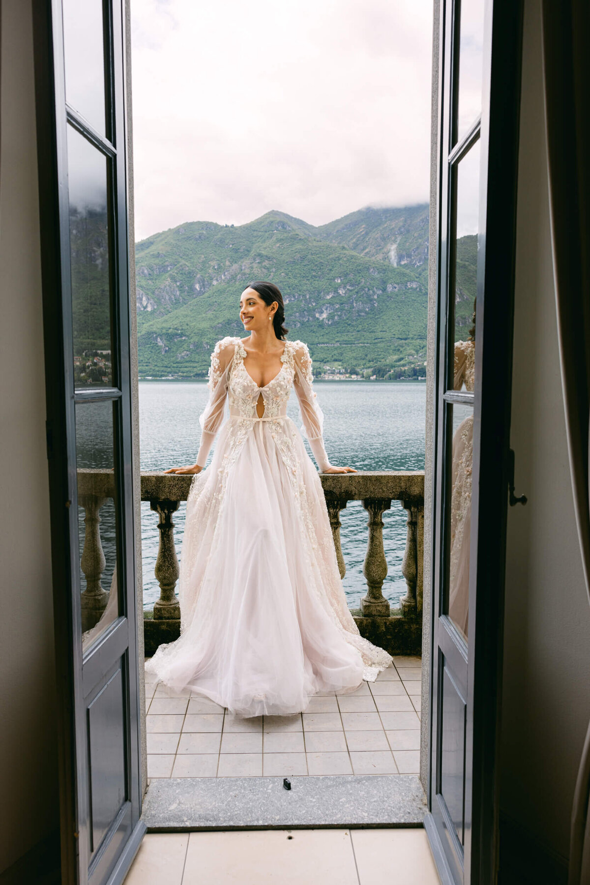 A wedding day bridal shot of a bride in her white dress at Villa Aura del Lago on lake como in Italy