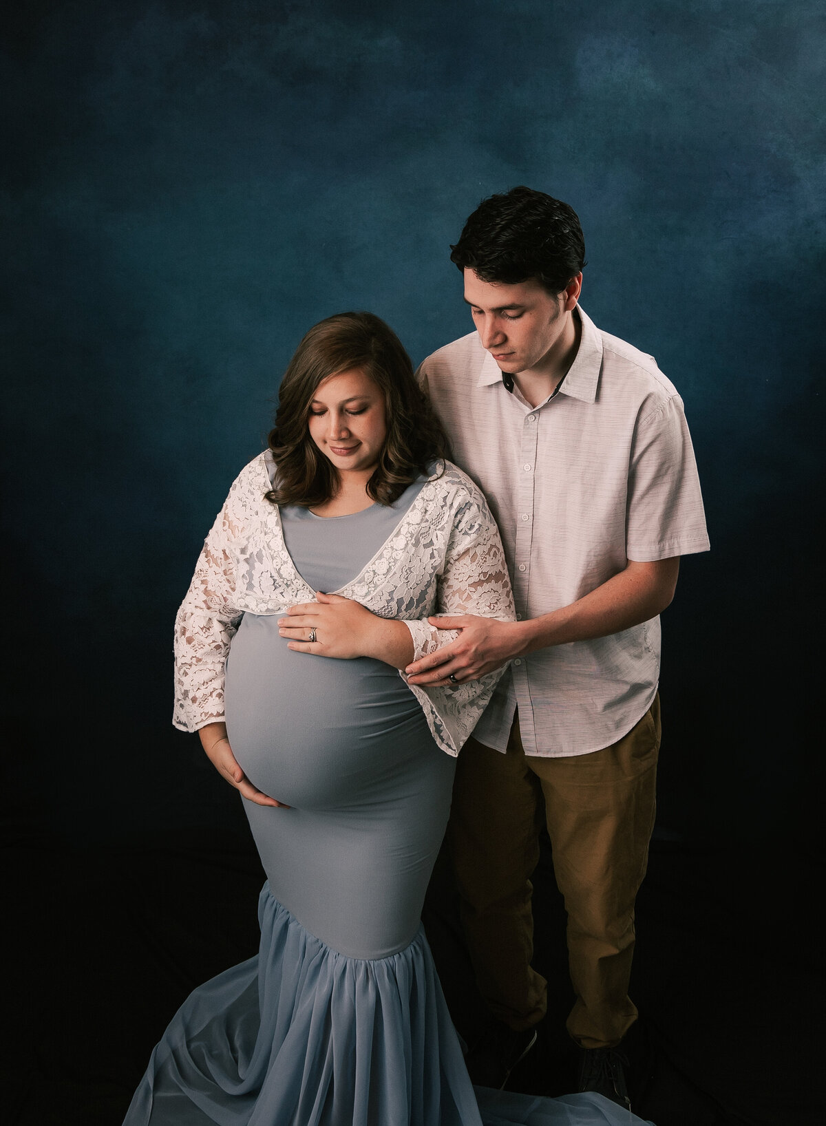 A studio maternity session with mom and dad. Utah maternity photography.