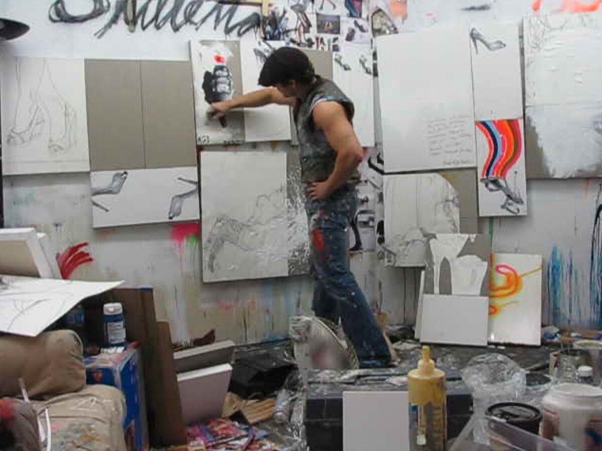 Brent Ray Fraser Working on Shoes Paintings Silo 03