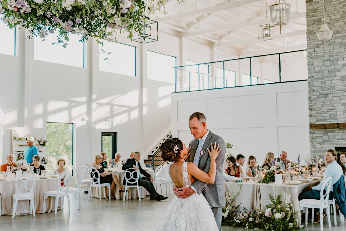 wedding-reception-couple-first-dance-emerald-hills-events-promise-city-iowa-des-moines-wedding-photographer-storyteller-collective-photo-co