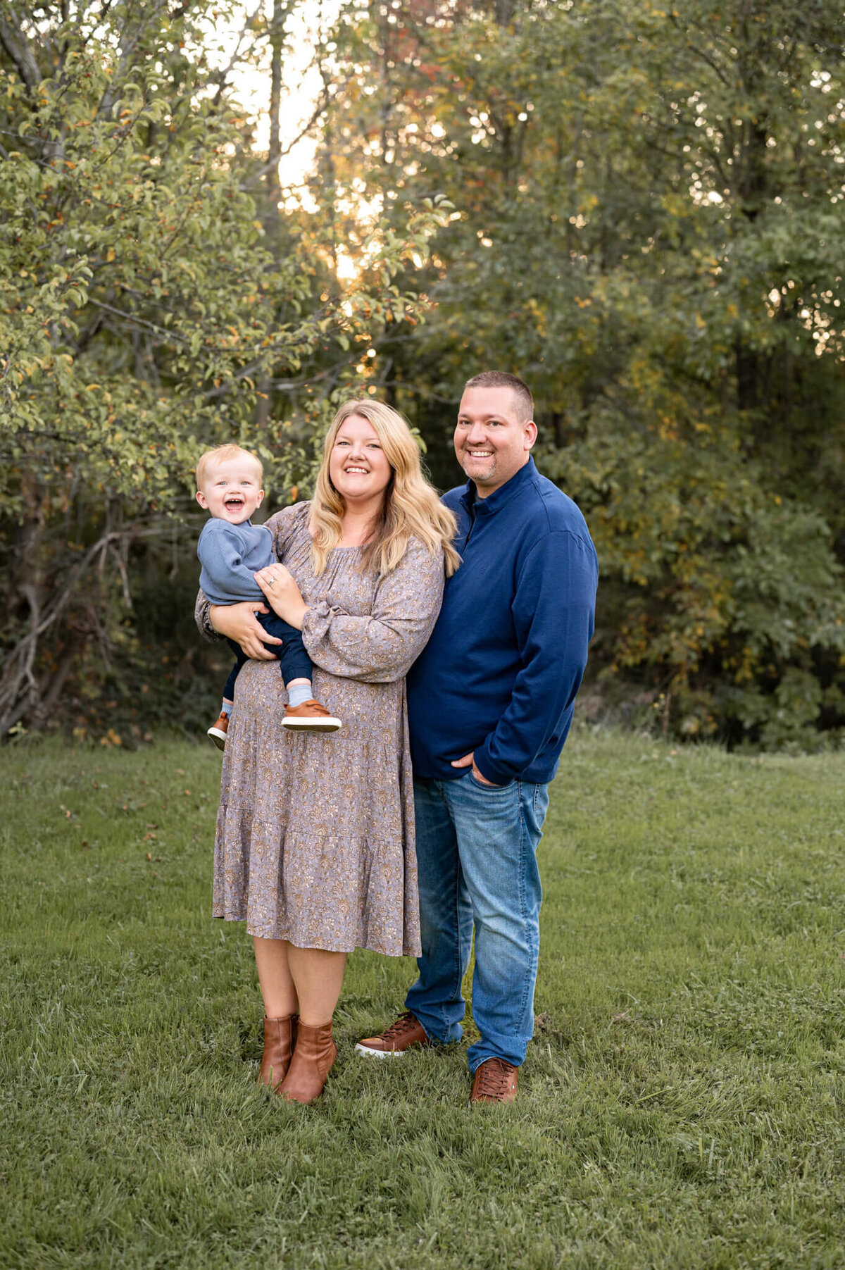 family looking at camera for photos