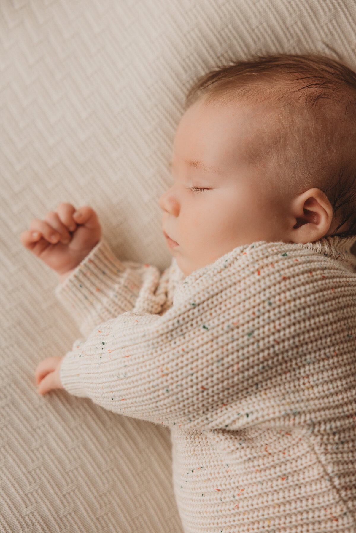 newborn baby posing during newborn photoshoot captured by Bie