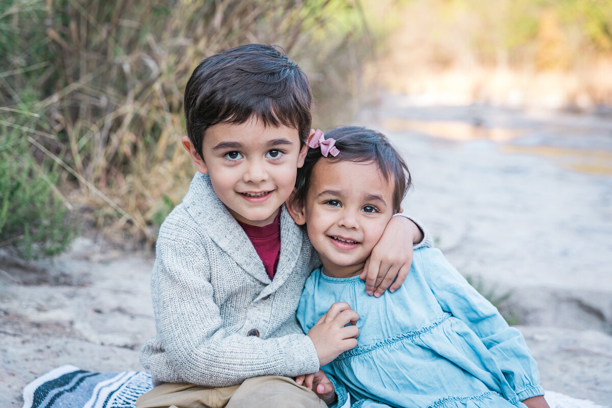 Siblings hugging and smiling photo, Austin Family Photographer, Tiffany Chapman Photography
