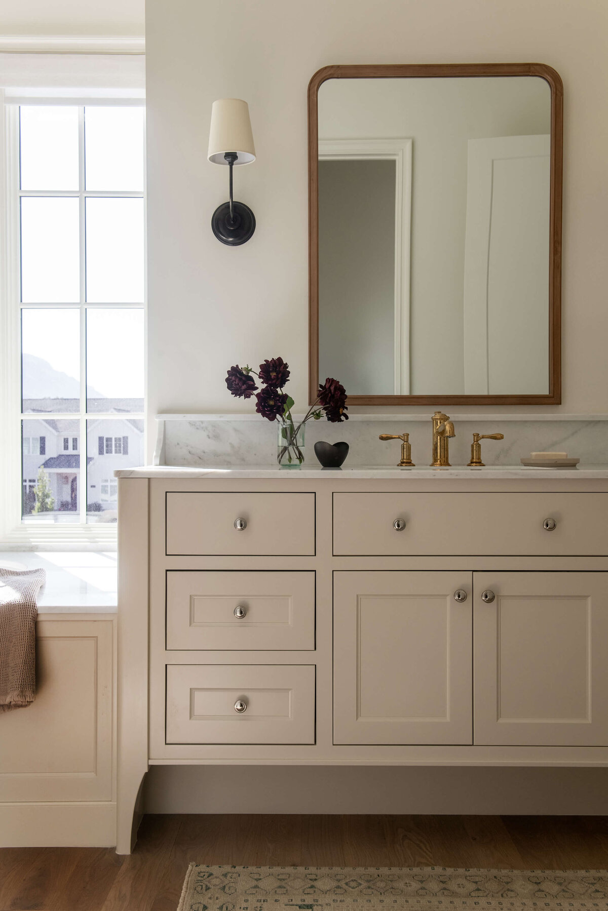 dutch-tudor-vanity-with-brass-fixtures-and-mirror