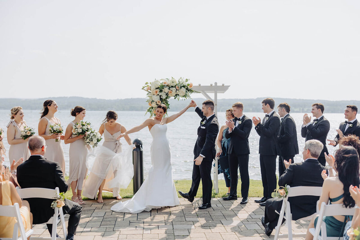 Bride and groom just married at outdoor wedding ceremony at Canandaigua Country Club, NY