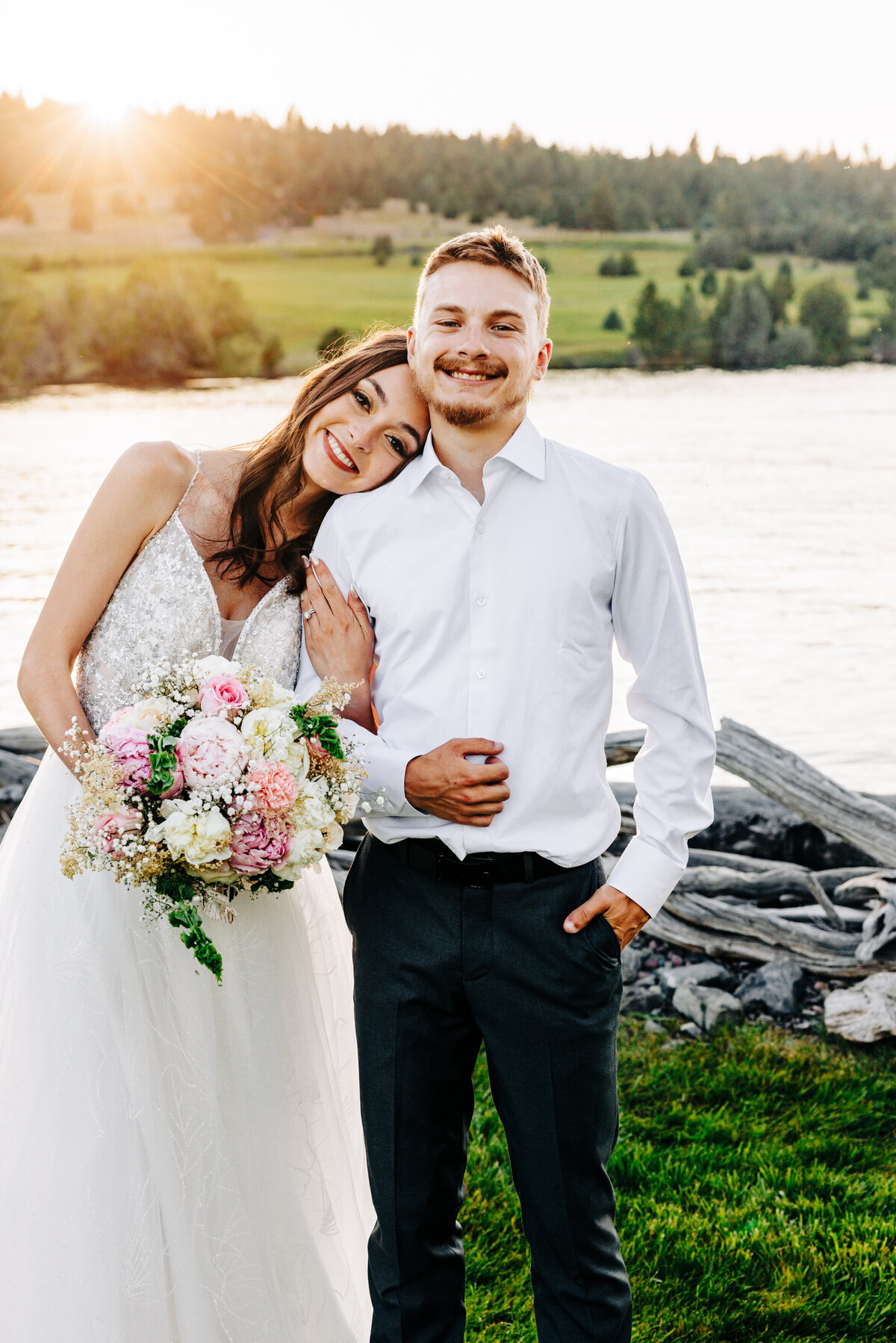 Sunset portrait of bride and groom at Flathead Lake Forevers in Big Arm, MT