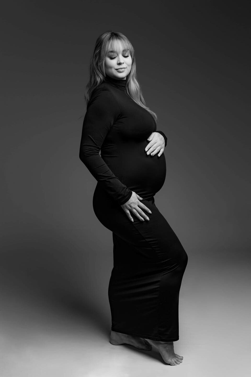 woman in black dress for phoenix studio maternity session