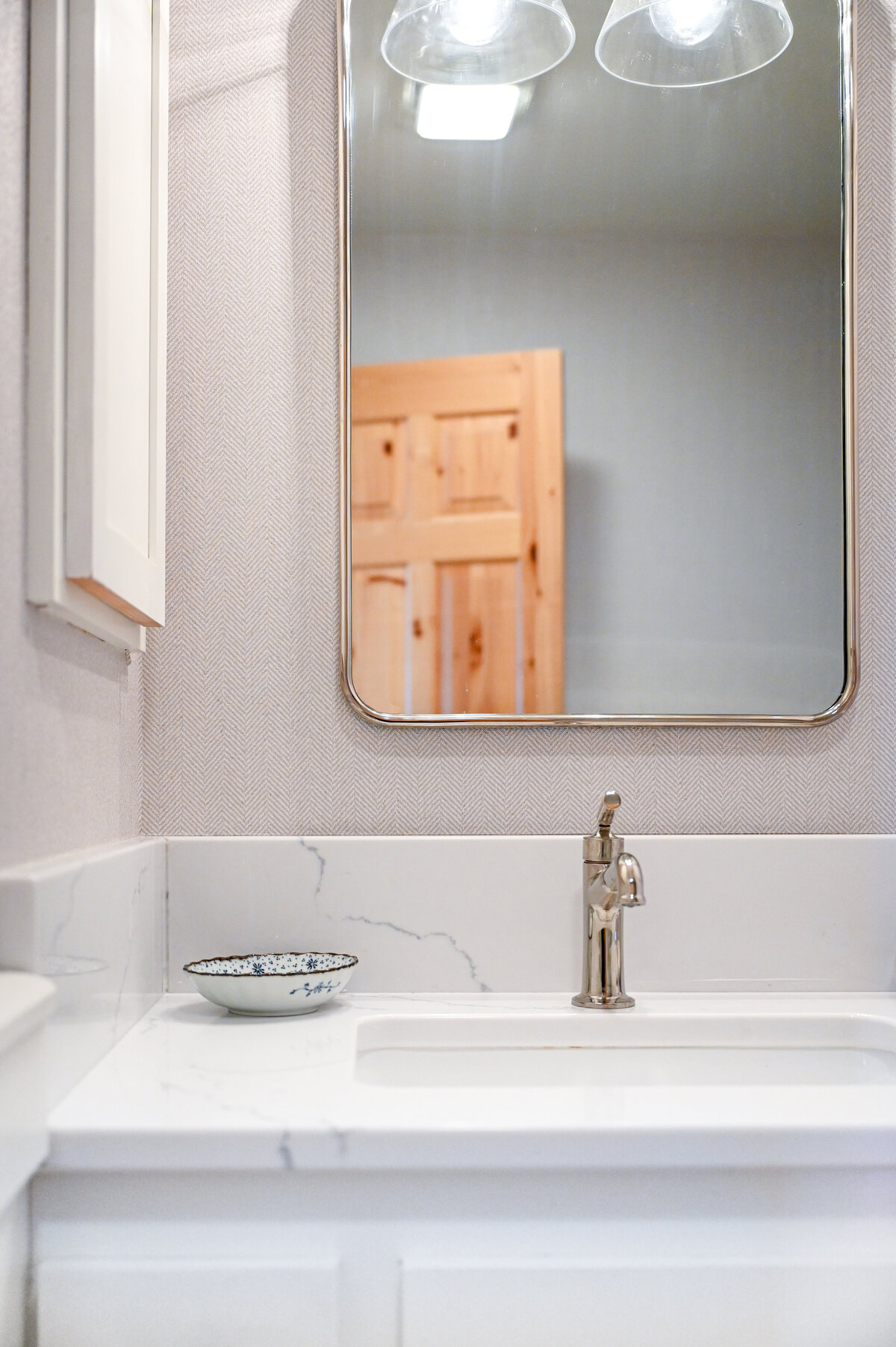 Schweitzer Cabin - Clean bathroom vanity for a ski retreat.