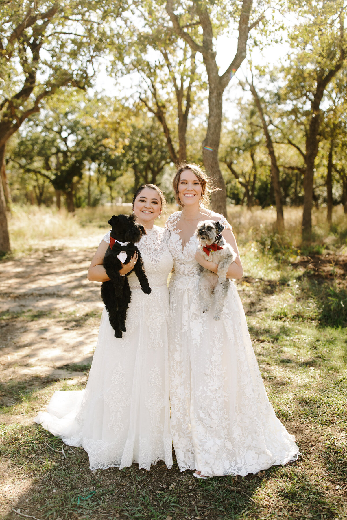 two-brides-with-dogs-on-wedding-day