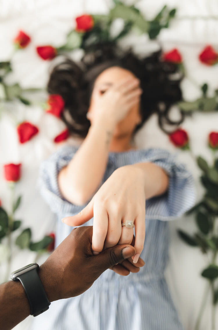 engagement-shoot-on-bed-with-roses-kitchener-photographer