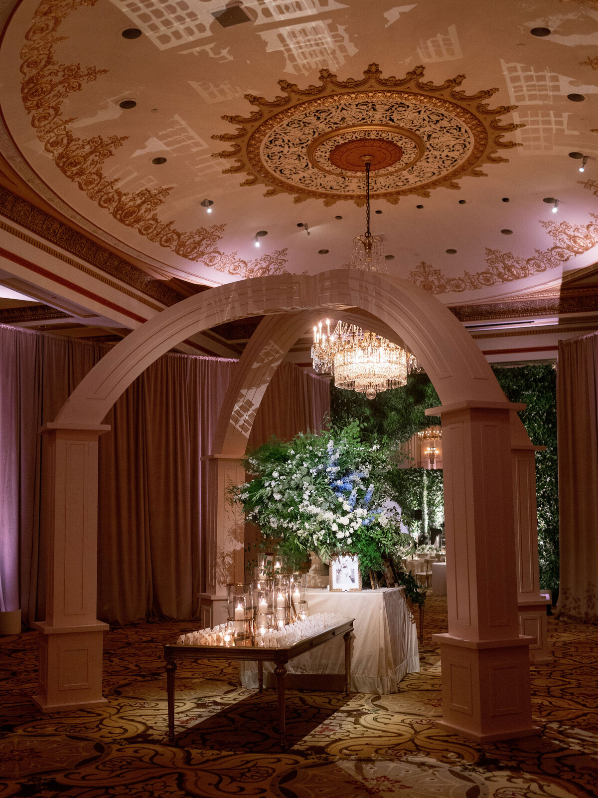 A picture of the wedding reception table displaying the seating assignments.