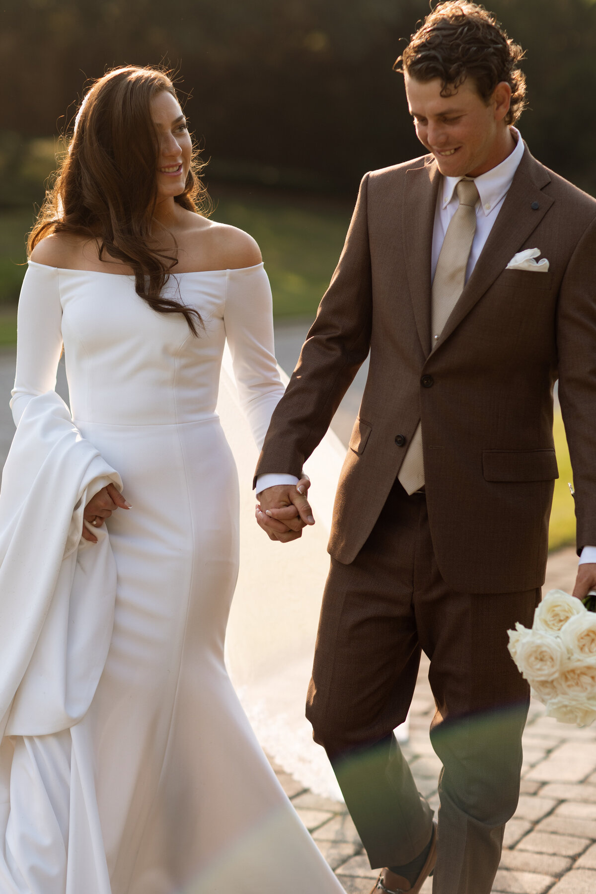 husband and wife holding hands, captured by The Deans Photo