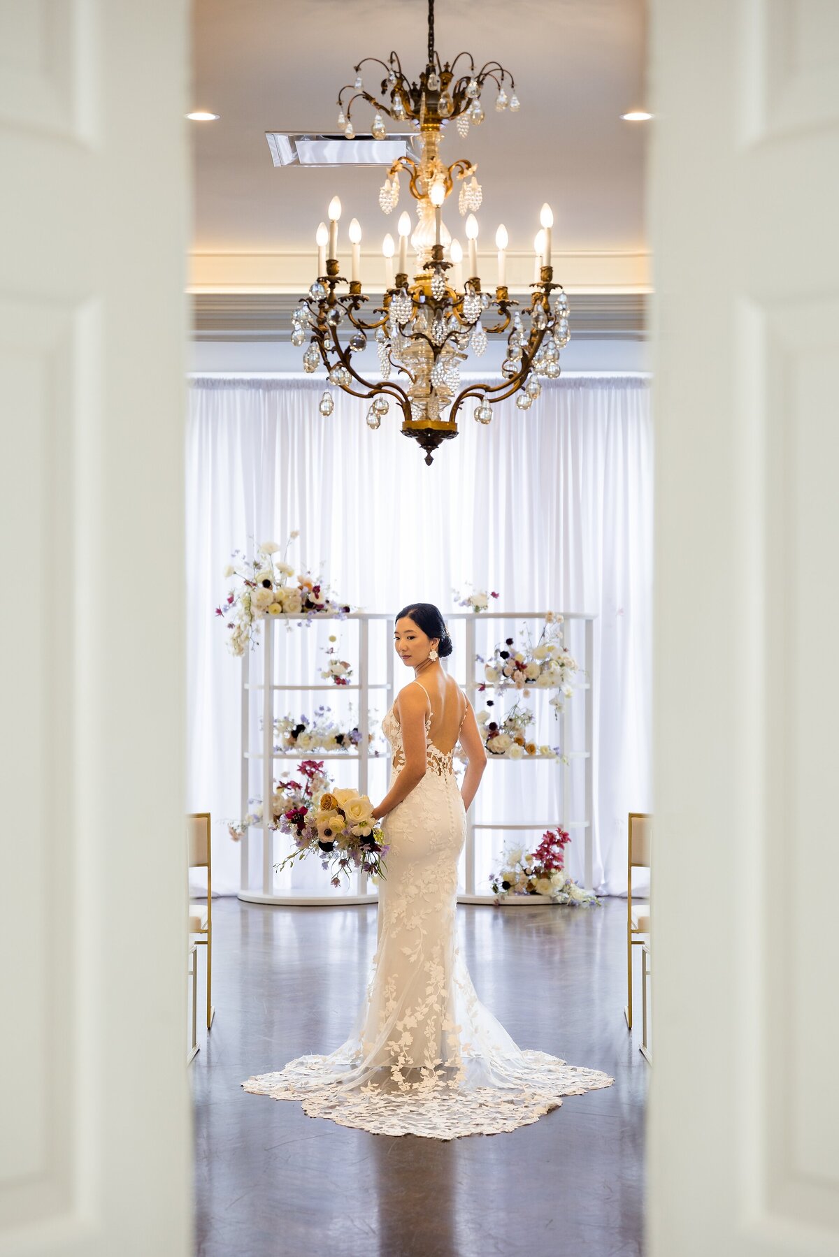 Bride-standing-in-ceremony-space-at-london-hunt-club