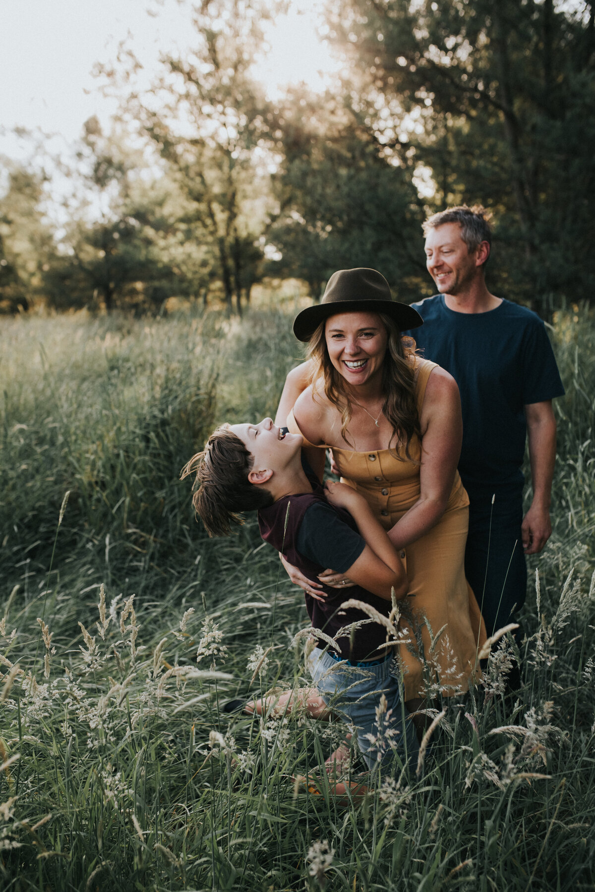 Candid family photo in Yarra Glen. Sunset Family session for Melbourne Family Photography Session. Sapphire and Stone Photography