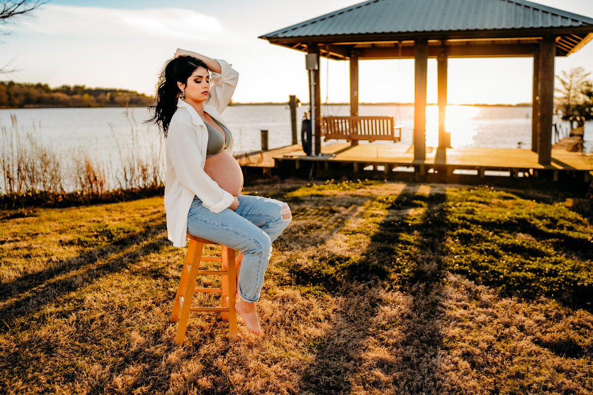 Casual maternity pose with stool at lake peigneur, new Iberia, la