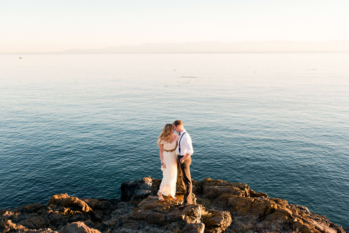 Bride and groom on the beach on Bainbridge island at sunset