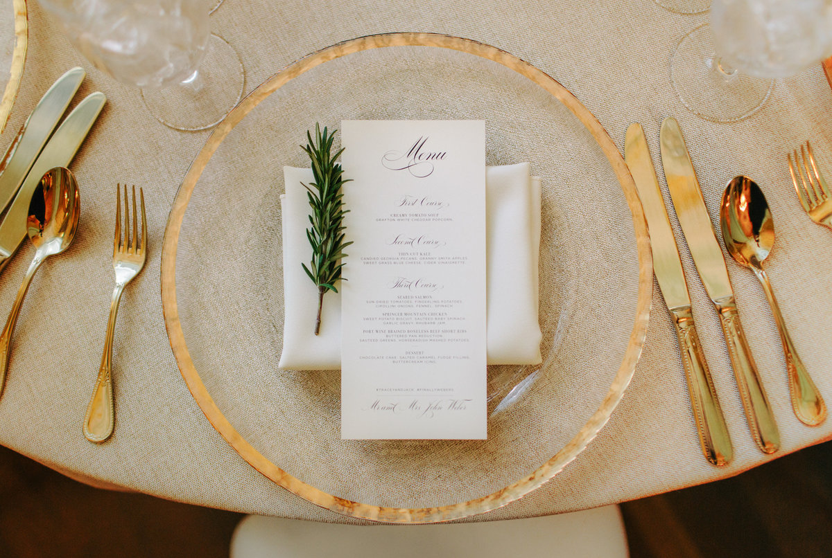 Gold place setting ideas by destination wedding photographer Rebecca Cerasani.