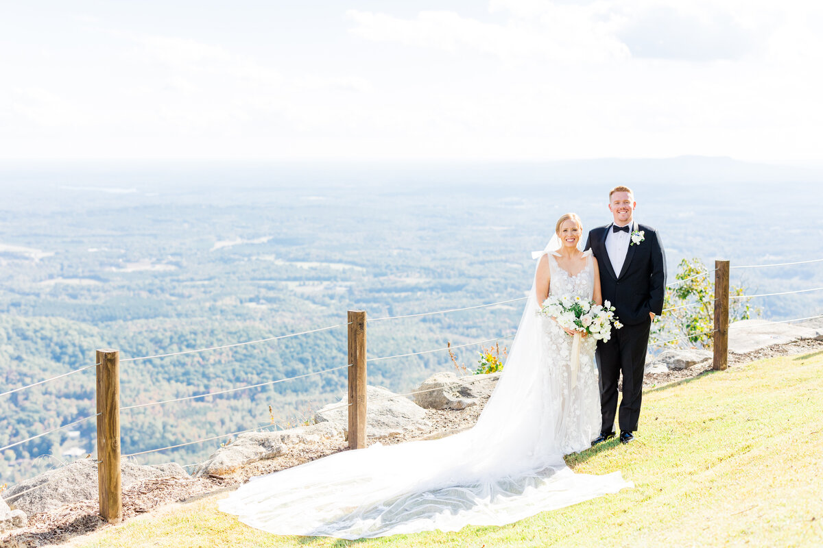 bride and groom smiling at wedding