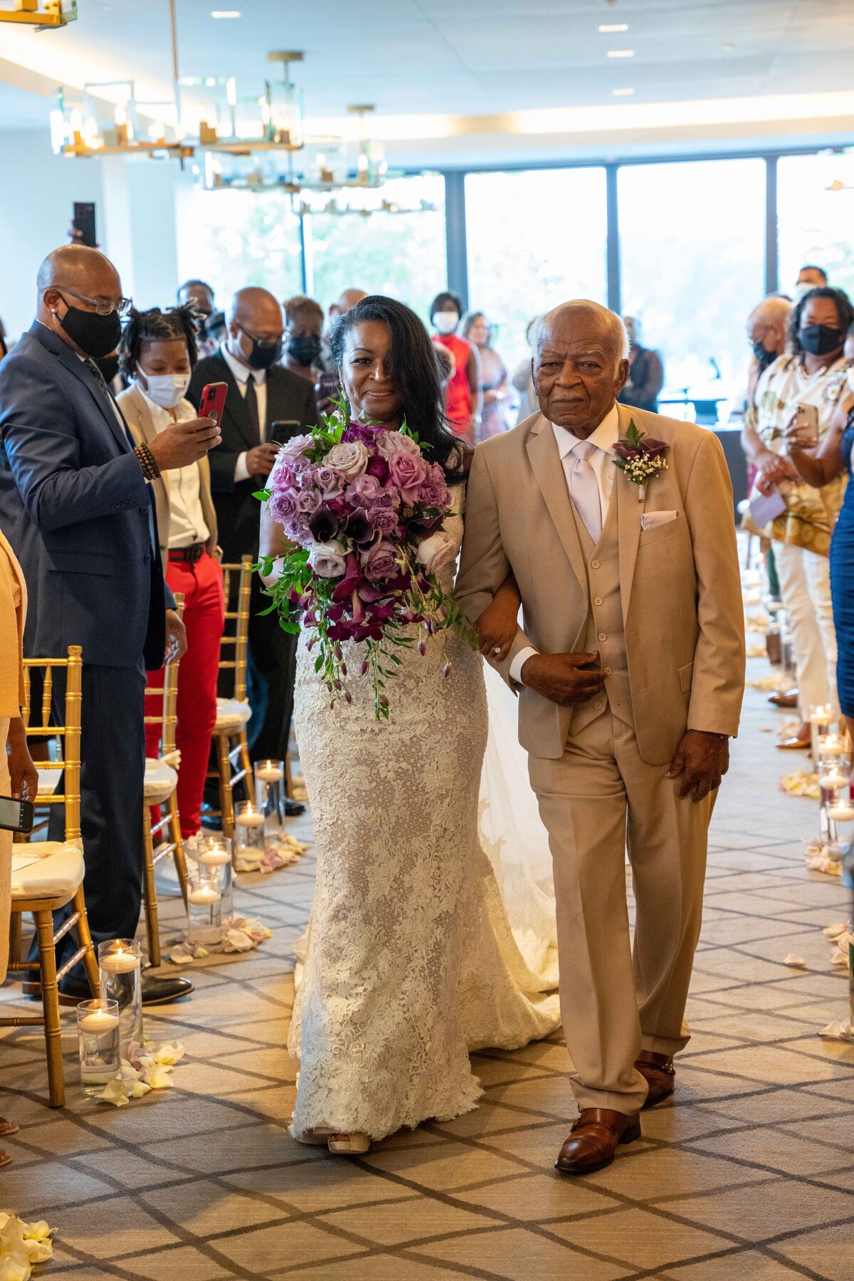 Bride is walked down the aisle by her father at the InterContinental Washington D.C.