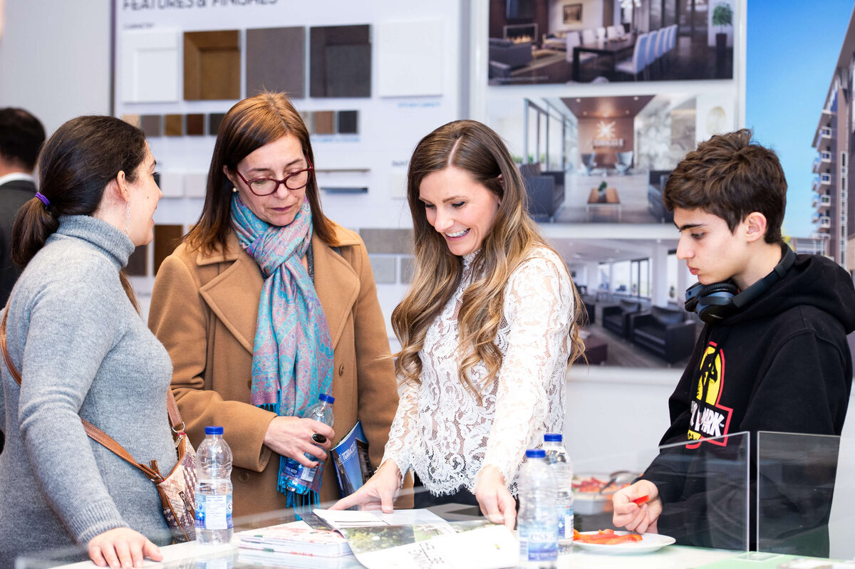 the eQ team mingling and chatting with guests during the Groundbreaking event.  the host of eQ addressing and welcoming guests to the eQ Groundbreaking event.  Captured by Ottawa Event Photographer JEMMAN Photography COMMERCIAL