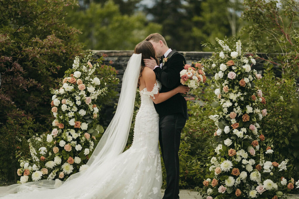 Wedding ceremony with beautiful cascading florals, planned by Coco & Ash, an intimate and modern wedding planner based in Calgary, Alberta.  Featured on the Brontë Bride Vendor Guide.