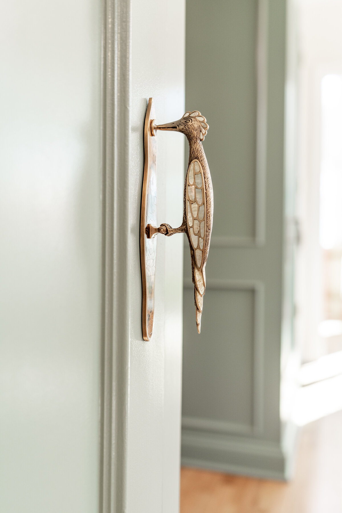 gold woodpecker door handle