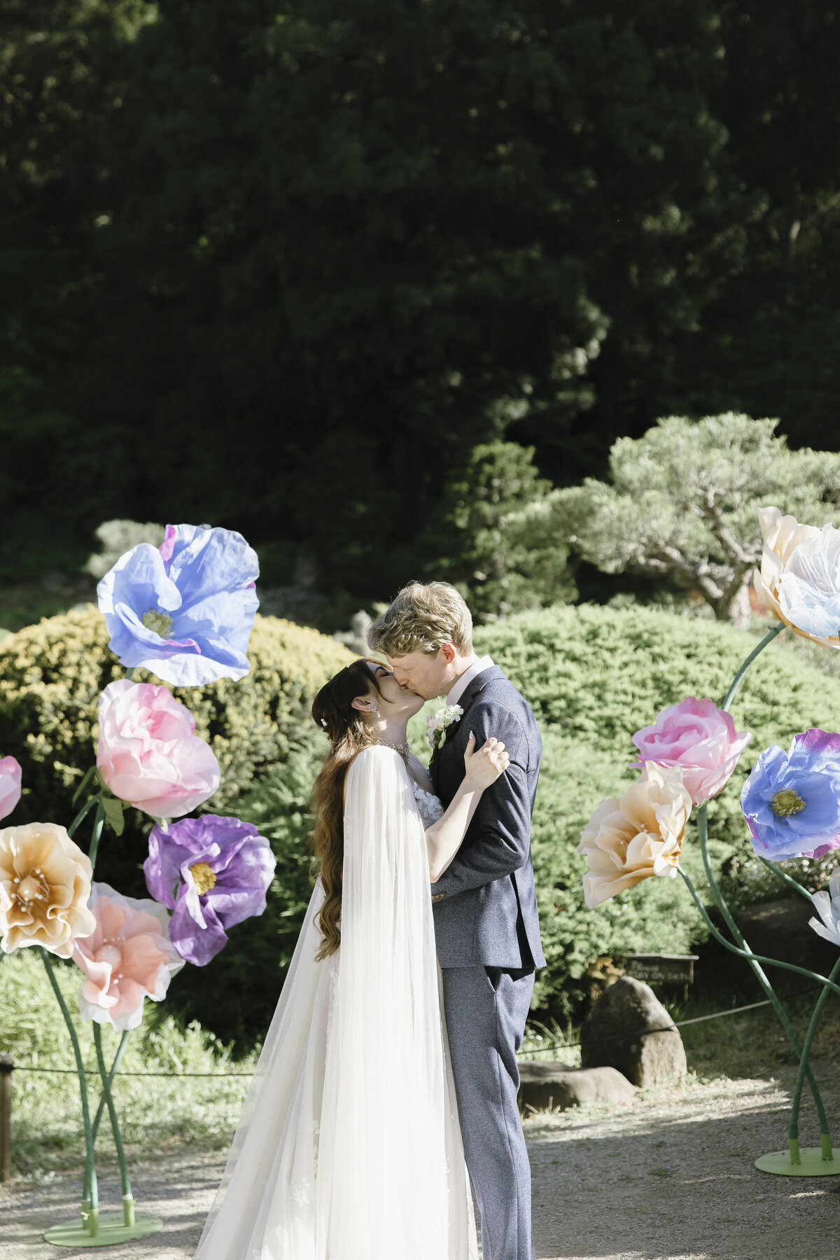 Bride and Groom posing in tea garden